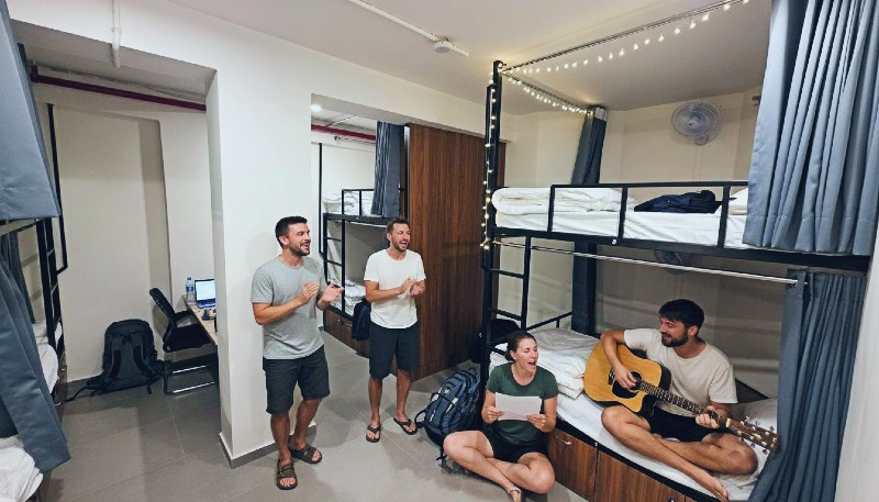 Guests relaxing in the dorm at Shikha Hostel Jaipur